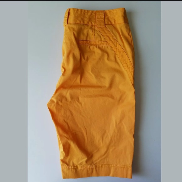 Annika Cutter and Buck Woman’s Orange Golf Shorts - Picture 3 of 7